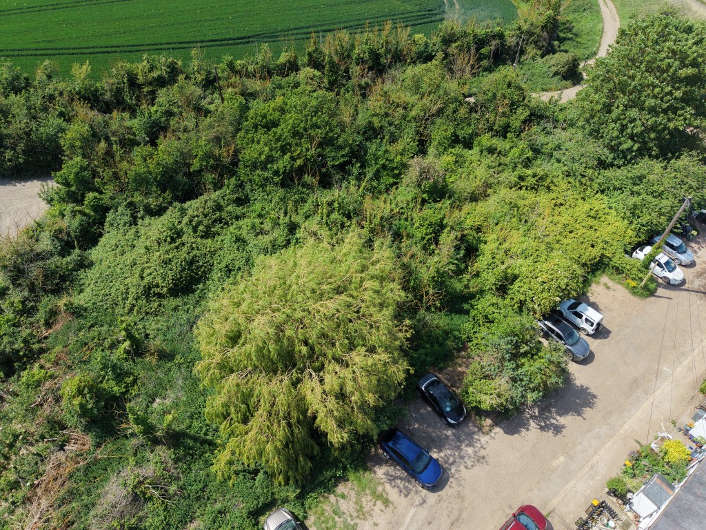 Lot: 12 - PARCEL OF LAND WITH POTENTIAL - Drone shot of left part of land